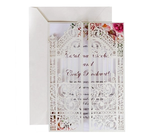 Laser-cut wedding invitation with cream hollow gate shell and floral inner card