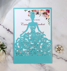 Detail of Tiffany blue laser-cut bridal dress invitation with elegant floral lace patterns