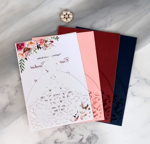 Laser-cut wedding invitation featuring elegant bride silhouette and floral details