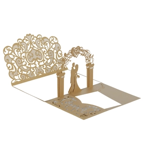Close-up of 3D laser-cut wedding invitation featuring champagne gold floral silhouettes
