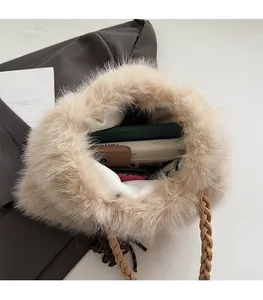 Interior view of plush tote bag showing spacious capacity for phone and notebook