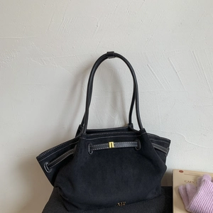 Vintage black matte tote bag with contrast stitching and golden metal buckle detail