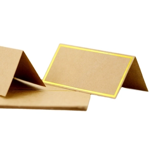 Elegant kraft paper place cards with gold foil borders for weddings and formal events