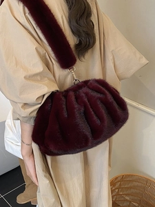 Elegant dark red faux fur cloud bag with ruched design and plush wide shoulder strap