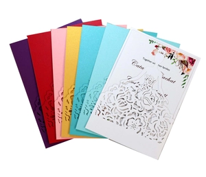 Laser cut floral wedding invitation cards in multiple elegant pearlescent colors