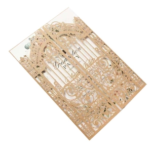 Detail of laser-cut baroque glitter invitation sleeve for graduation party