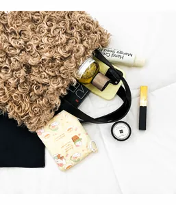 Interior view of brown teddy plush tote bag showing large capacity for essentials