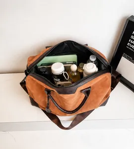 Interior view of large brown suede tote bag showing spacious storage for essentials