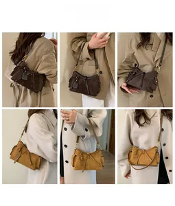 Detail shots of large tote bag with chain strap in dark coffee and camel suede finish