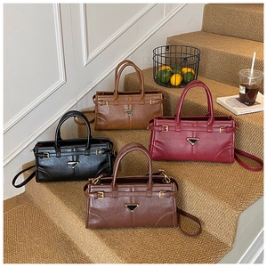 Detailed comparison of four retro Boston handbags in black, brown, wine red and coffee