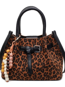 Leopard print crossbody bucket bag in frosted texture with decorative wooden beads