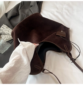 Top view of large brown faux suede tote bag showing the spacious interior and magnetic closure