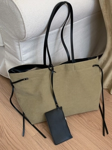 Retro khaki canvas tote bag with black leather handles and detachable small pouch