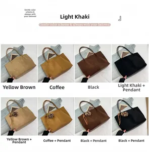 Detail view of large tote bags in four colors with suede finish and leather straps
