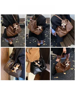 Collage of vintage oversized tote bag in brown and black leather with rabbit charm