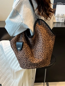 Retro leopard print suede tote bag with black straps and matching mini pouch accessory