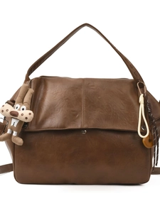Retro dark brown large capacity tote bag with bunny pendant and smooth leather texture