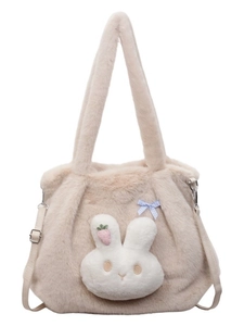 Large beige plush tote bag with bunny head decoration and strawberry embroidery detail