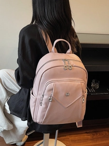 Pink lychee texture backpack for women with large capacity and stylish silver ring zippers