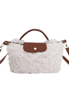 Chic winter faux shearling handbag with brown leather trim and golden snap closure