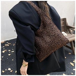 Chic leopard print oversized shoulder bag shown on model for autumn street style look