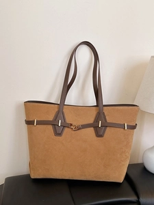 Large capacity vintage tote bag in tan suede with dark brown handles and gold hardware