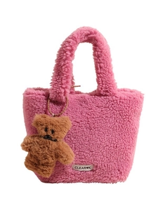 Pink plush bucket bag with teddy fleece texture and a cute brown bear charm