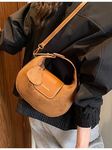 Brown vintage frosted hobo bag with adjustable strap and heart-shaped charm decoration