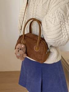 Vintage brown suede bowling bag with a cute teddy bear charm and silver metal hardware