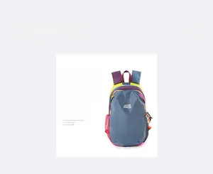 Close-up of green and blue contrast outdoor backpack with durable mesh side pocket