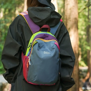 Detail view of multicolored outdoor hiking backpack with Bogewade logo and mesh side pocket