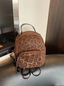Retro leopard print backpack for women featuring large capacity and soft faux fur texture