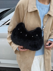 Plush black faux fur handbag with silver star studs and metal chain strap for women