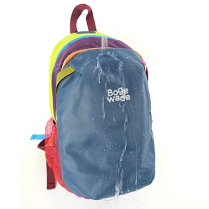 Close-up showing the excellent waterproof and hydrophobic effect on the colorful backpack