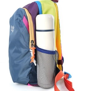 Detail of multi-color hiking backpack side mesh pocket with a water bottle inside