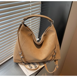 Detailed view of camel large capacity hobo bag featuring premium PU leather and silver rings