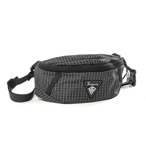 Detail of grid texture on chest bag with logo, buckle and durable zipper cord