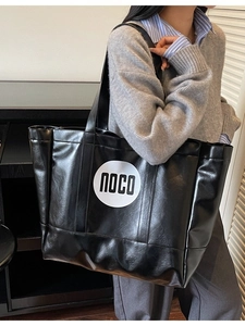 Minimalist black PU leather tote bag with round noco logo for women daily commuting