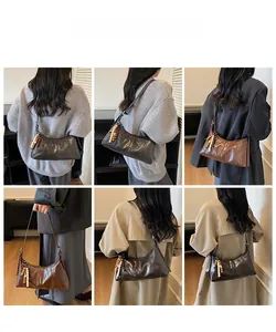Detailed views of vintage crossbody hobo bag with ethnic style beaded tassel charms
