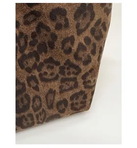 Close-up of durable leopard print fabric with matte texture and scratch-resistant finish
