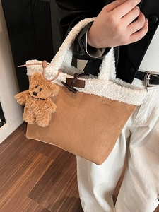 Brown faux suede tote bag with white sherpa trim and a cute plush bear pendant accessory