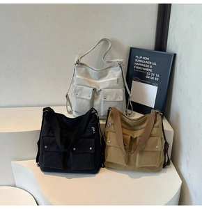Minimalist canvas tote bags in cream black and khaki with dual utility front pockets