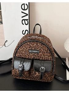 Mini sac à dos mode imprimé léopard avec poches noires vernies et logo de marque