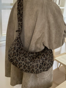 Large leopard print tote bag for women showing a stylish casual commuter look