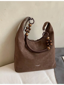 Sac cabas léopard en daim marron avec poignée perlée vintage et logo Carolmanti