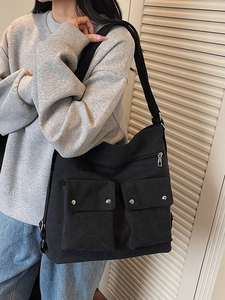 Modische schwarze Segeltuch-Einkaufstasche mit Utility-Klapptaschen und Gurtband