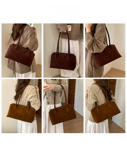 Close-up of retro suede tote bag showcasing high-quality texture and rich coffee brown color
