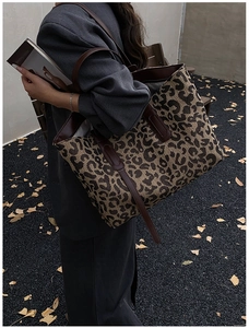 Large leopard print tote bag with brown leather straps for autumn outdoor fashion