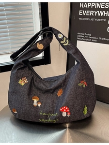Sac bandoulière en toile gris foncé avec broderies nature et large bandoulière