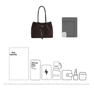 Internal capacity detail of large brown matte tote bag showing storage for 6.7 inch smartphone